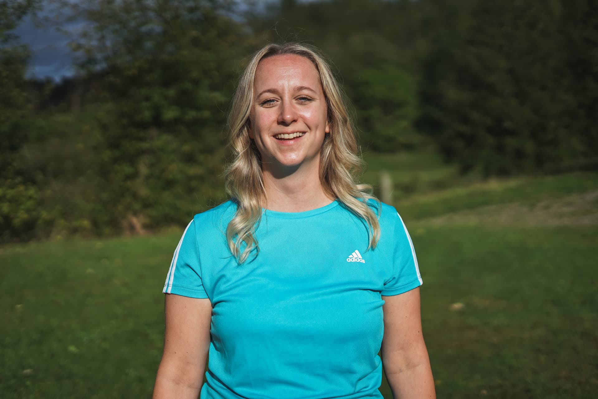 Fitness Trainer Dominique Schoßland Gütersloh lächelt in die Kamera